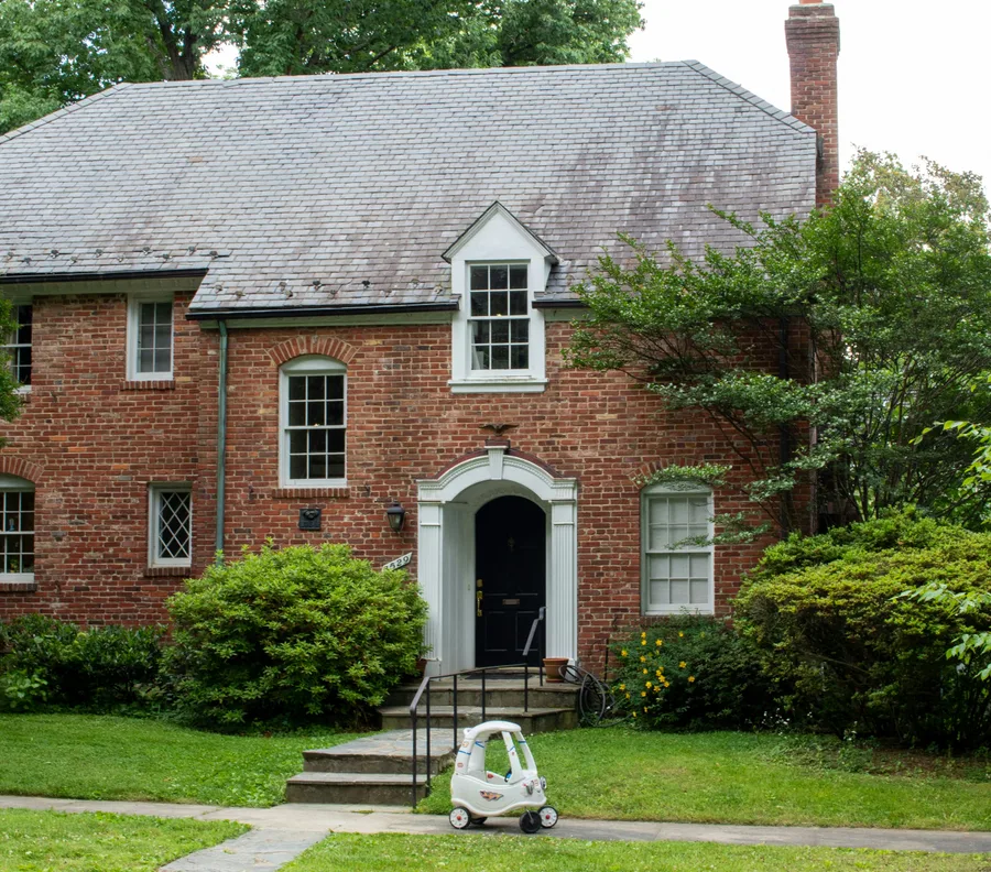 Brick house with a green lawn